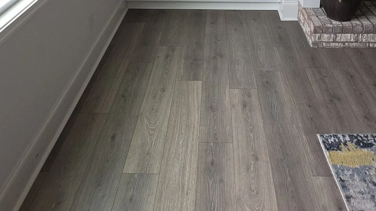 Finished flooring and baseboard detail in a North Georgia home