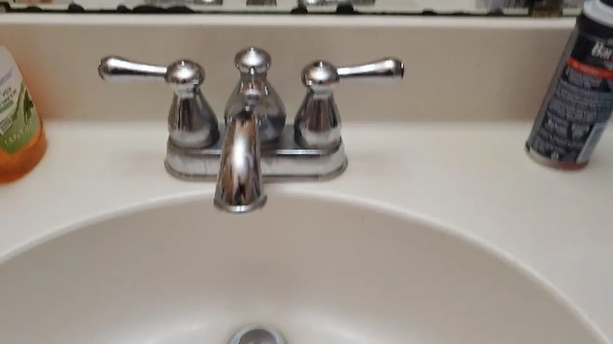Bathroom faucet repair and fixture work